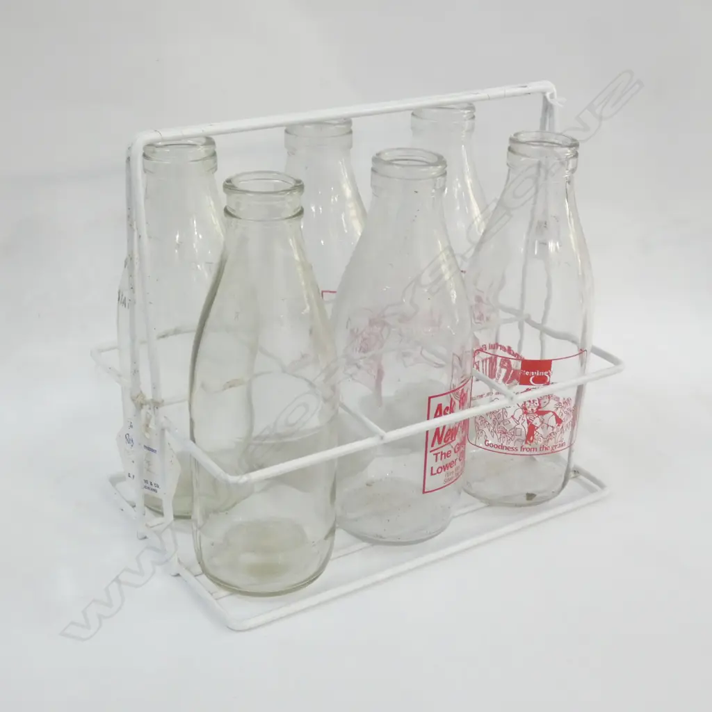 6 MILK BOTTLES IN METAL CARRIER Image 1++