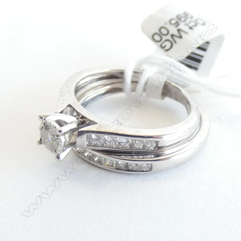 10CT WG RING SET, 1 X 16PT DIAM, 23 X 1.4PT DIAM, 3.83G Image 1++