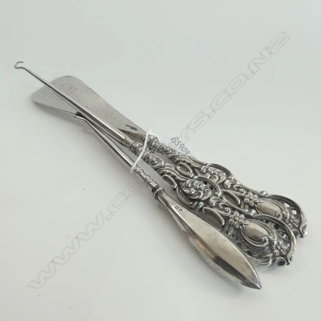 THREE SILVER HANDLED ACCESSORIES - 2 BOOTHOOKS & SHOE HORN Image 1++
