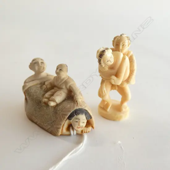 TWO JAPANESE IVORY EROTIC NETSUKE
