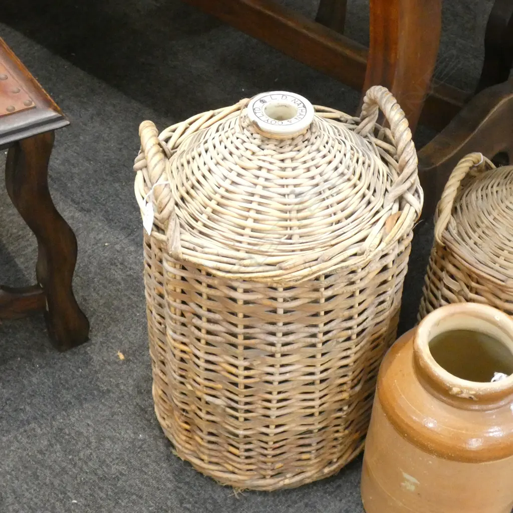 LARGE STONEWARE KEG IN CANE BINDING, MARKED TO TOP L.D. NATHAN  Image 1++