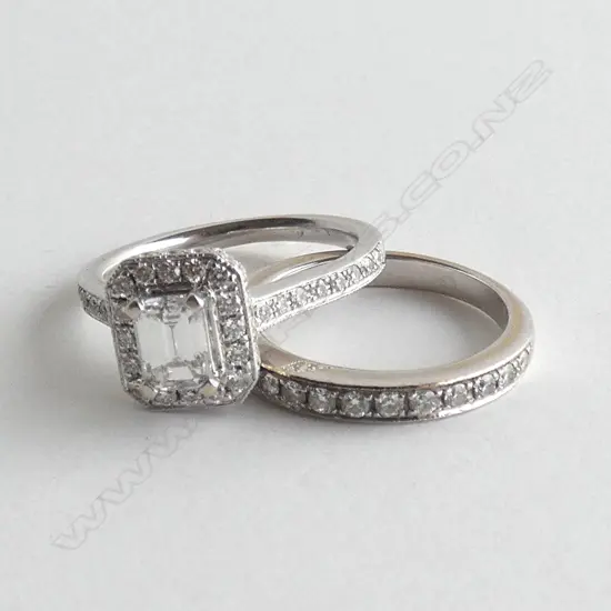 18CT WHITE GOLD AND DIAMOND CLUSTER RING 0.40ct emerald cut & DIAMOND SET BAND (valuation)