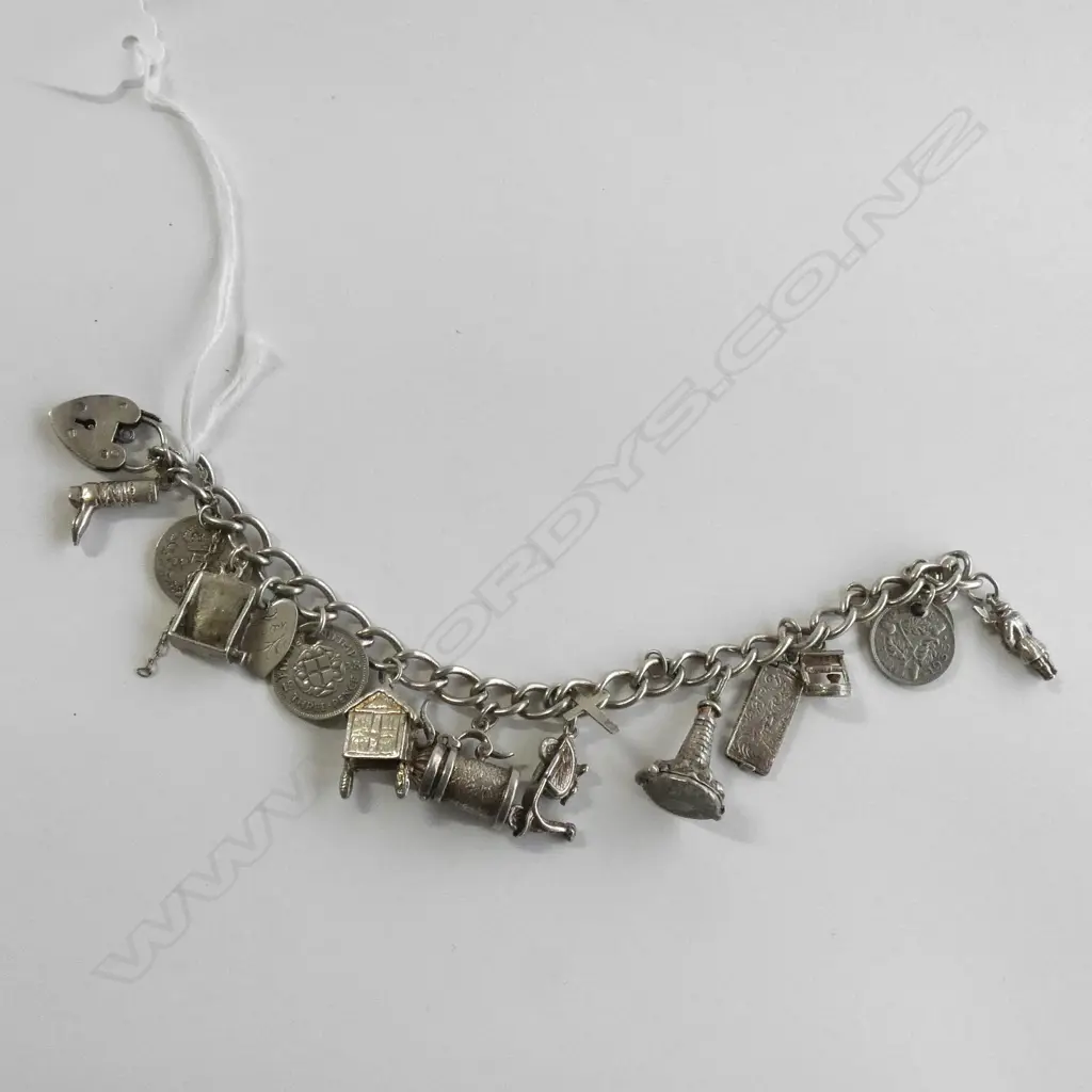 (17719) SILVER CHARM BRACELET 15 CHARMS Image 1++