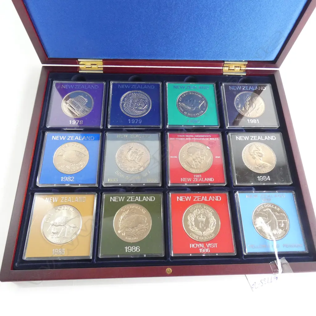 CASE OF 12 UNC NZ $1 COINS EA IN PLASTIC CASE 1980'S ETC Image 1++