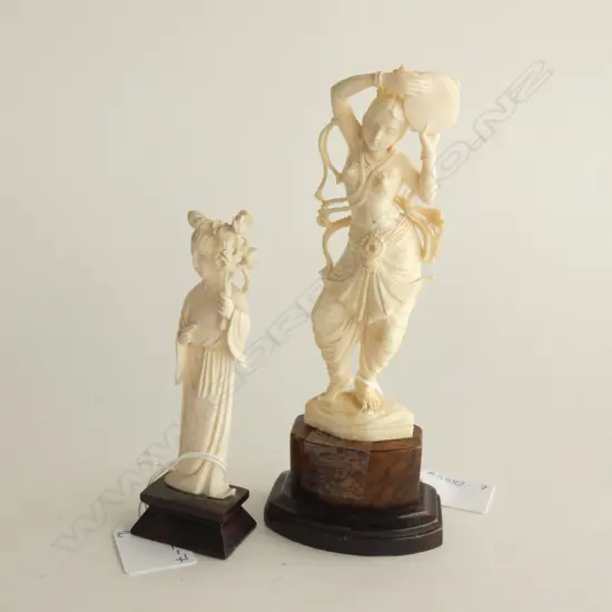 2 CARVED IVORY LADY FIGURINES; 1 ORIENTAL (H 120MM) & ONE INDIAN (H 180MM) BOTH ON WOODEN STANDS