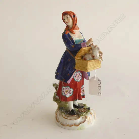 (17815) VINTAGE FIGURINE - LADY W DOG IN BASKET H 195MM