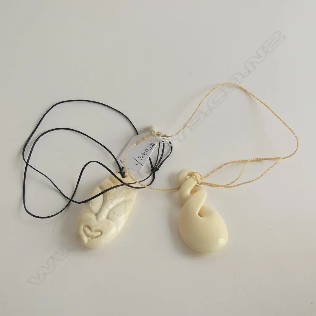 2 CONTEMPORARY BONE PENDANTS ON PLAITED CORDS Image 1++
