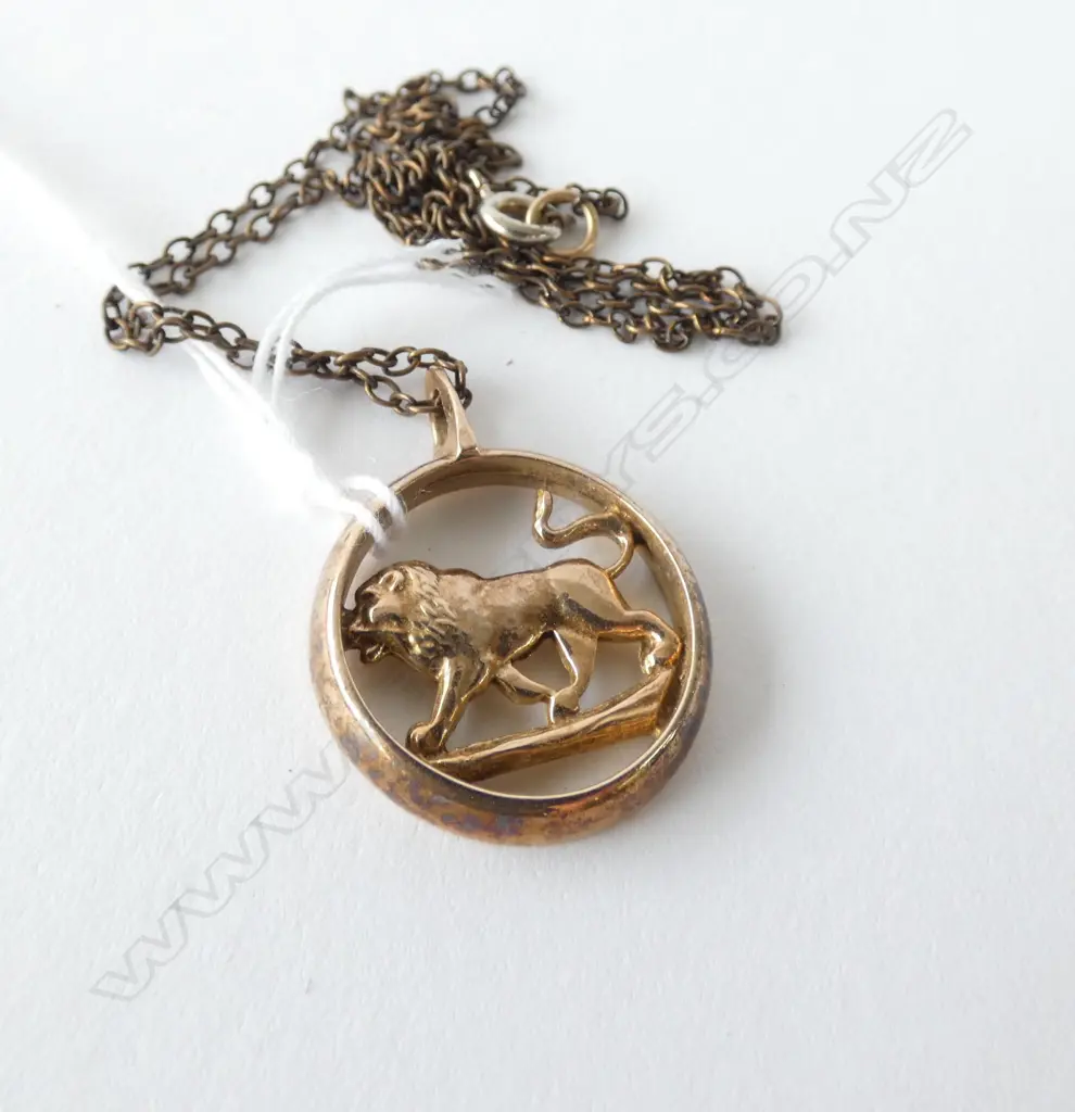 9CT LION PENDANT  3.6 GRAMS ON METAL CHAIN Image 1++