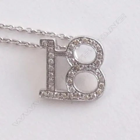 9CT WHITE GOLD DIAMOND SET '18' PENDANT AND CHAIN Image 1++