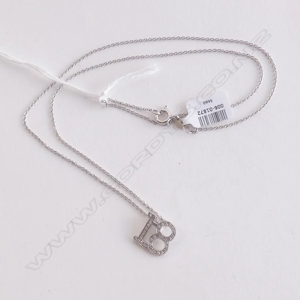 9CT WHITE GOLD DIAMOND SET '18' PENDANT AND CHAIN Image 1++