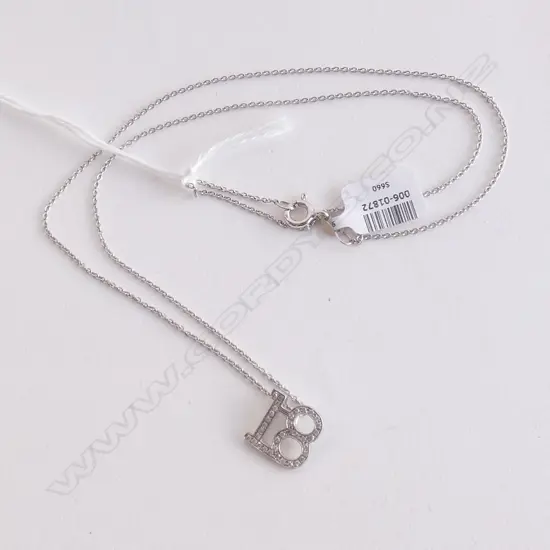 9CT WHITE GOLD DIAMOND SET '18' PENDANT AND CHAIN