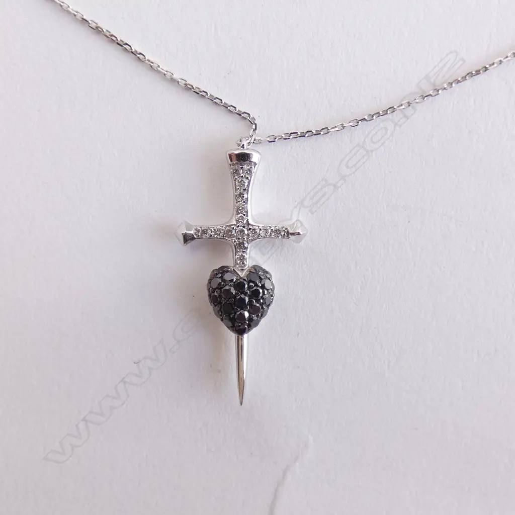 18CT WHITE GOLD SWORD AND HEART DIAMOND PENDANT Image 1++