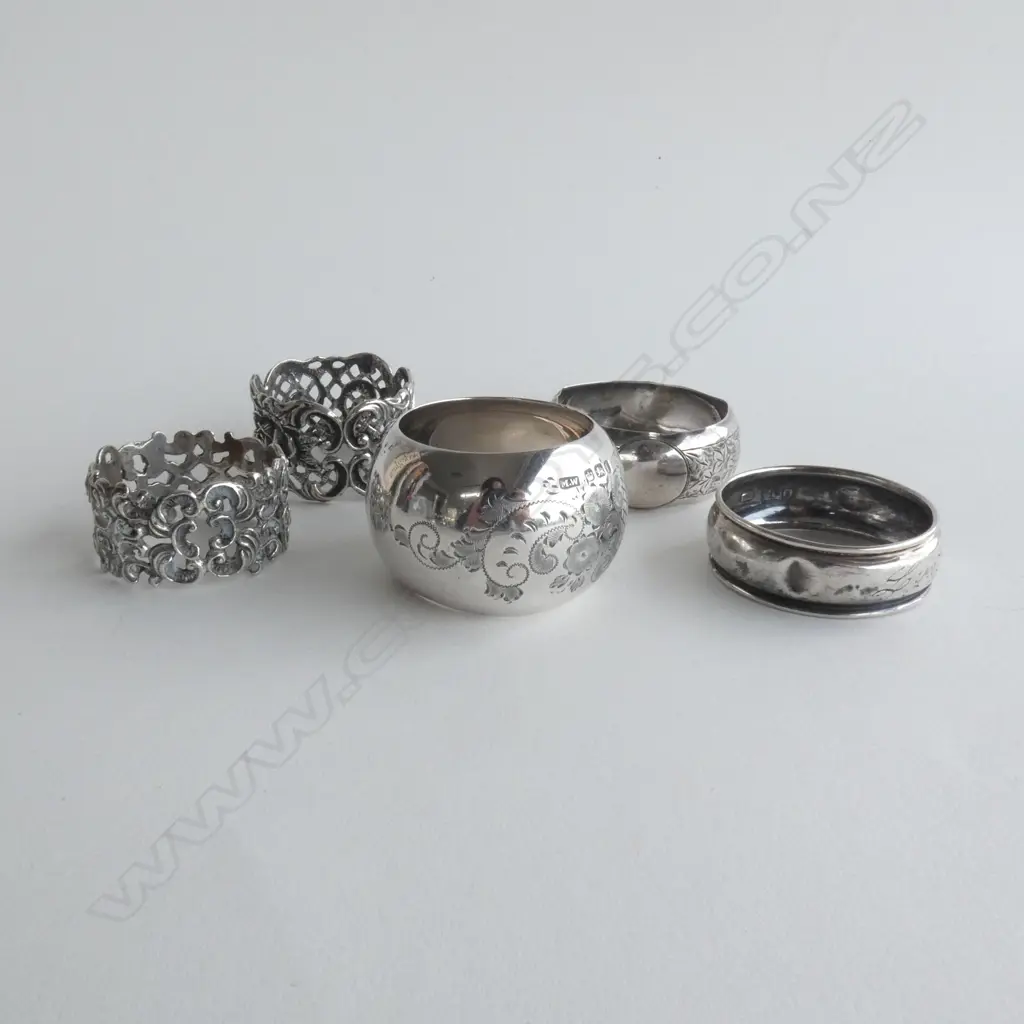5 ASST STG SILVER NAPKIN RINGS  Image 1++
