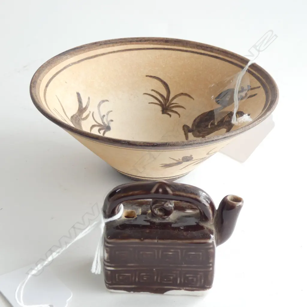 the bowl biscuit fired and decorated in brown with birds and floral design Image 1++
