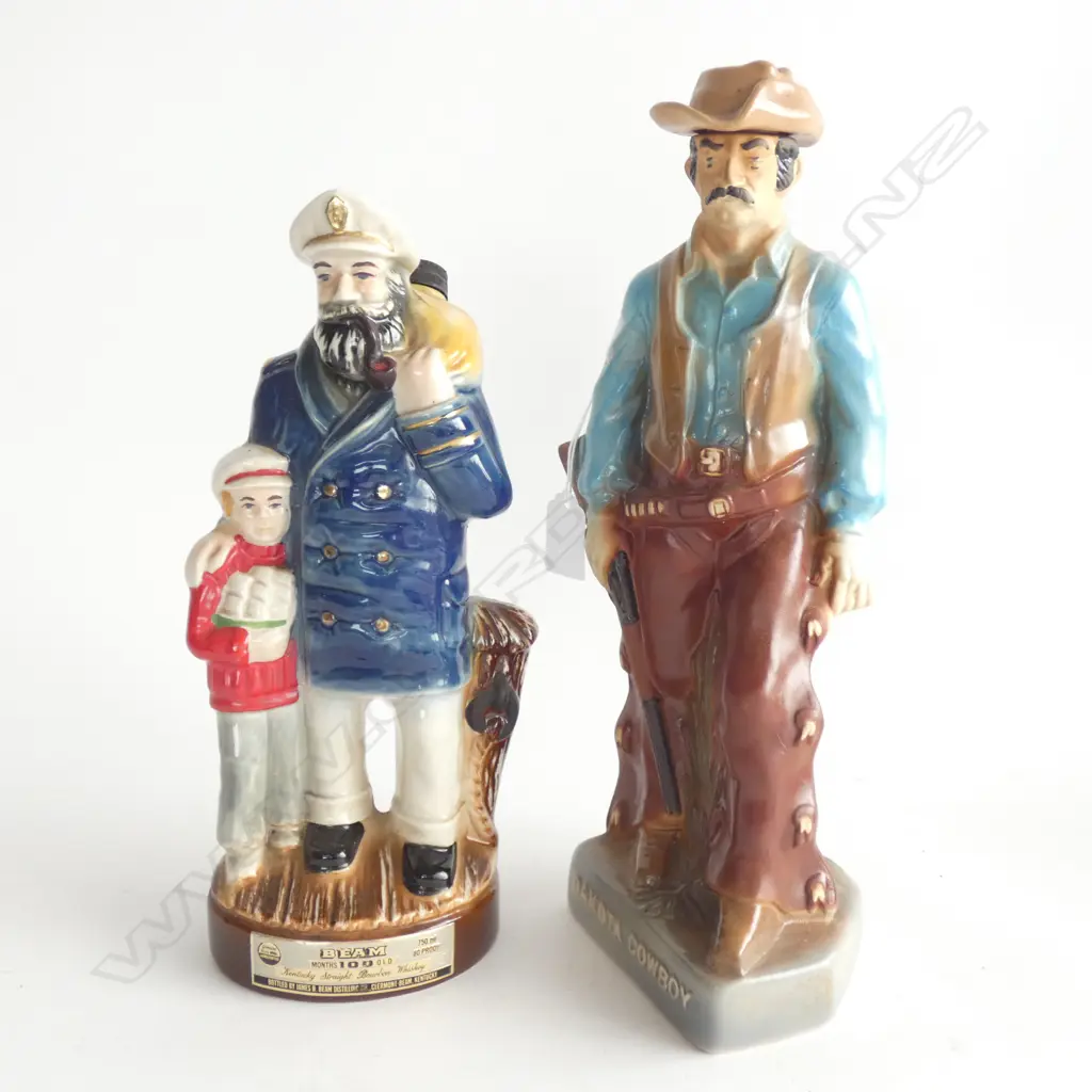 2 CERAMIC ALCOHOL DECANTERS; 'DAKOTA COWBOY' H.350mm + JIM BEAN SEA CAPTAIN Image 1++