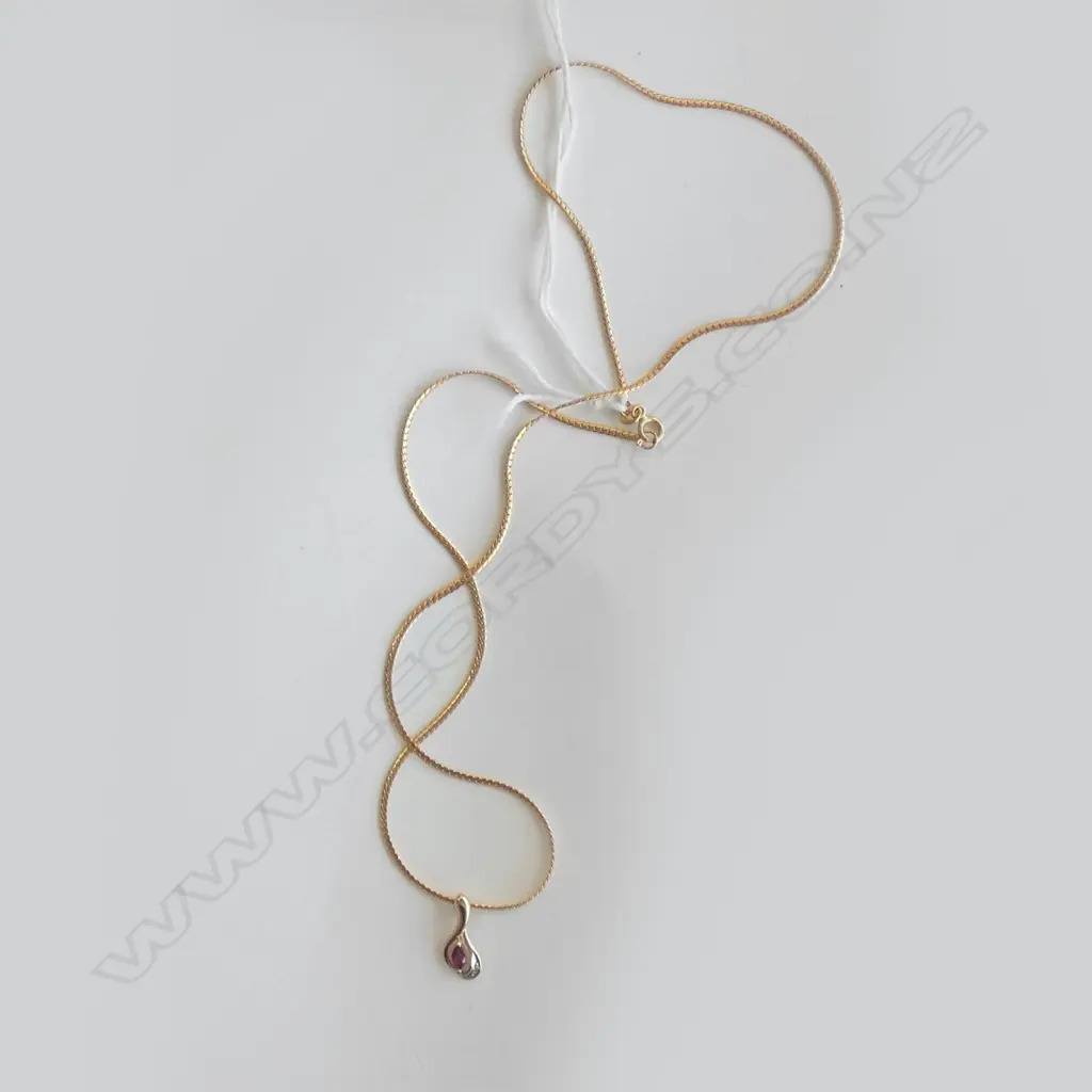 18CT GOLD CHAIN & 9CT GOLD PENDANT 5.90gm Image 1++