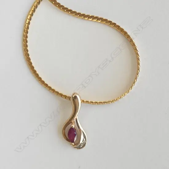 18CT GOLD CHAIN & 9CT GOLD PENDANT 5.90gm