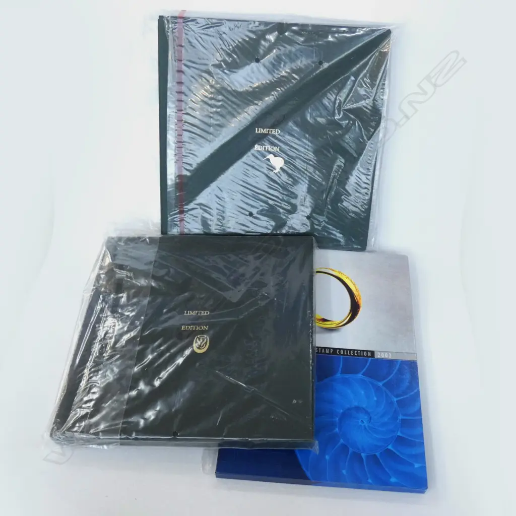 3 LTD ED COLLECTABLE STAMPS IN PRESENTATION BOOKS Image 1++
