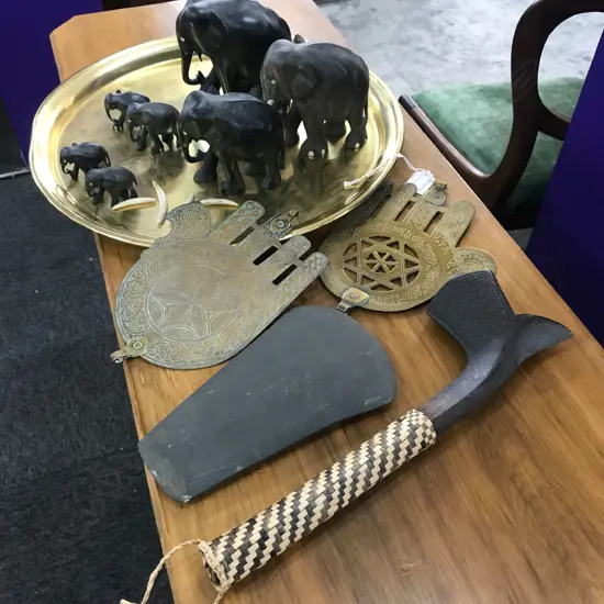 BRASS TRAY, SET GRADUATED EBONY ELEPHANTS, 2 BRASS HANDS, PACIFIC CLUB & ADZE BLADE
