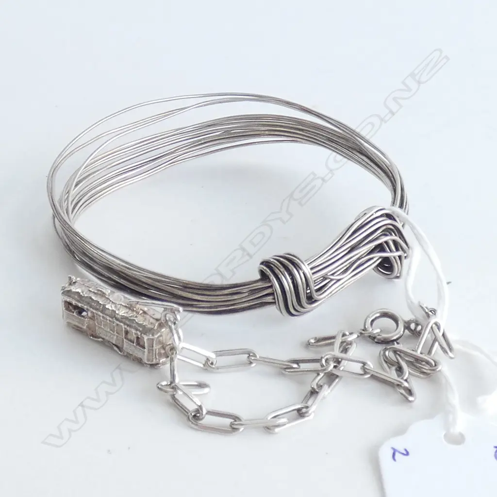 TWO SILVER BRACELETS Image 1++