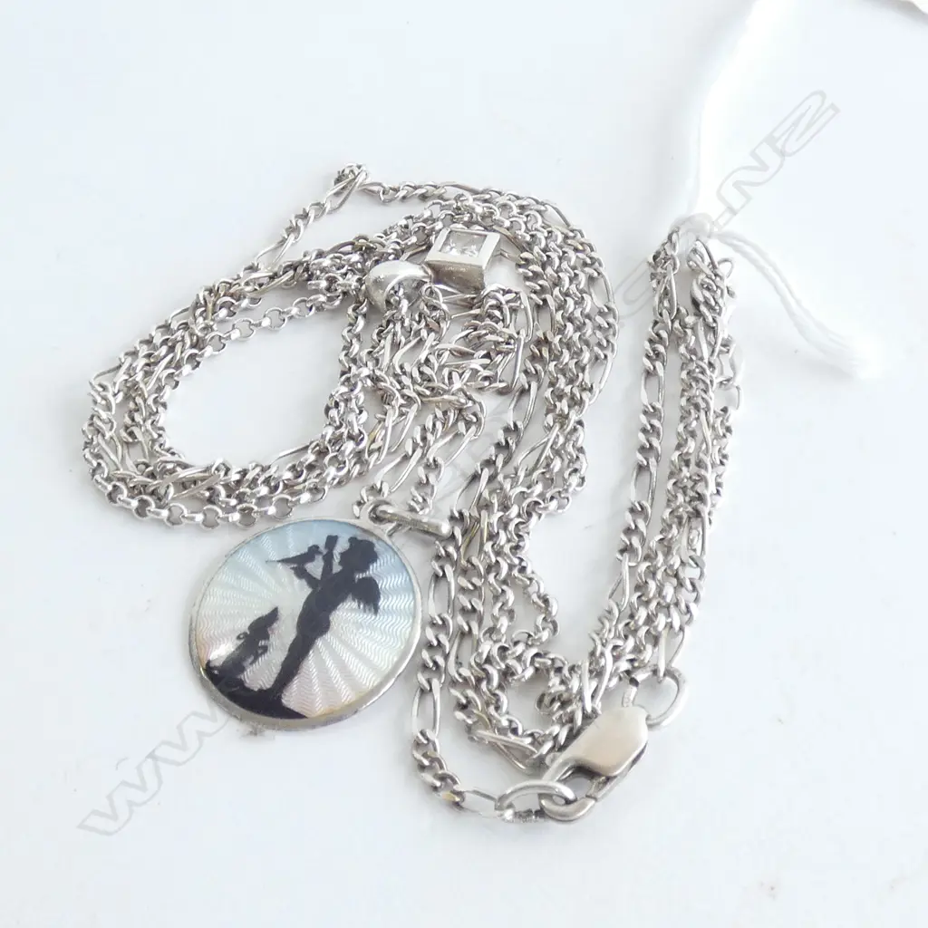 TWO SILVER CHAINS AND PENDANTS Image 1++