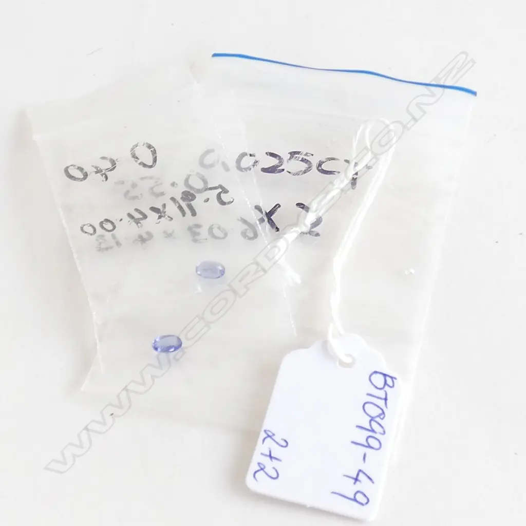 2 X 025CT DIAMONDS + 2 TANZANITE STONES Image 1++