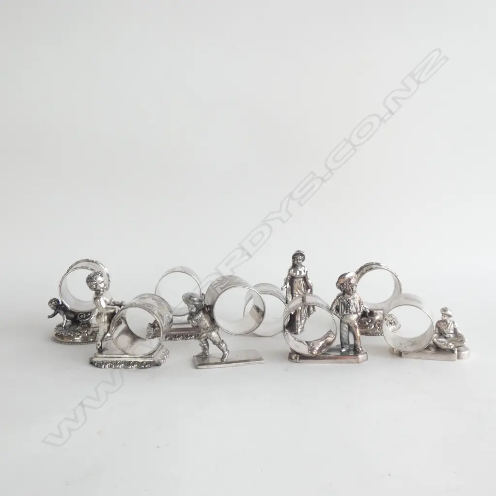 8 ASST VINTAGE SILVER PLATE NOVELTY NAPKIN RINGS; CHERUBS / FIGURES ETC.. Image 1++
