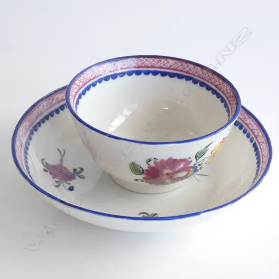 A STAFFORDSHIRE TEA BOWL AND SAUCER, 18TH CENTURY