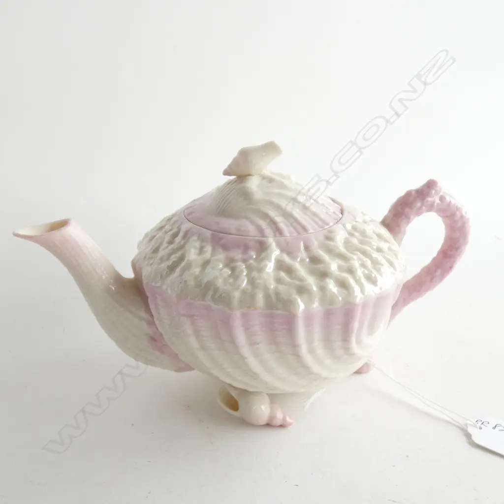 A BELLEEK TEAPOT, BLACK MARK, PINK AND WHITE SHELL Image 1++