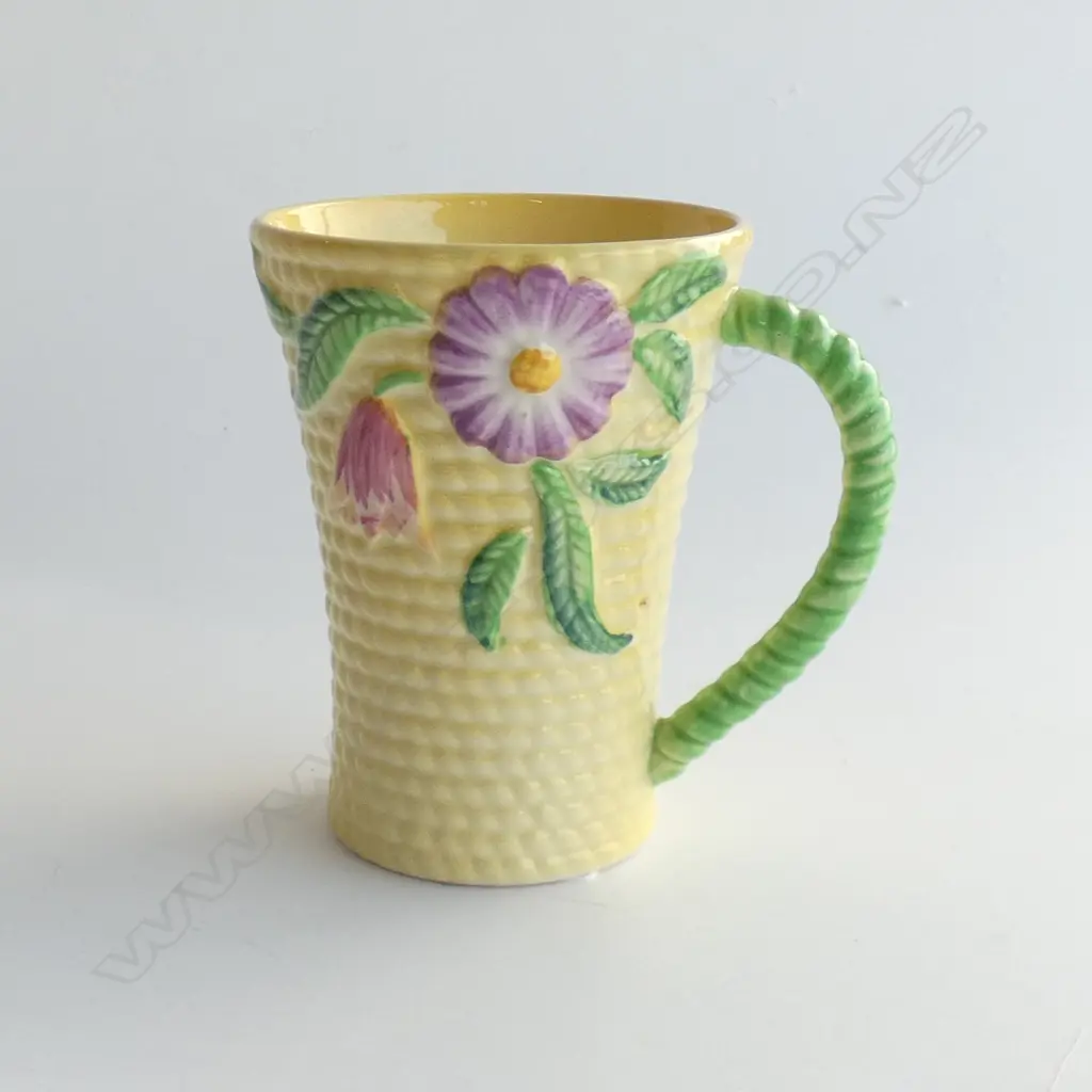 A CARLTONWARE EMBOSSED CHOCOLATE MUG, YELLOW Image 1++