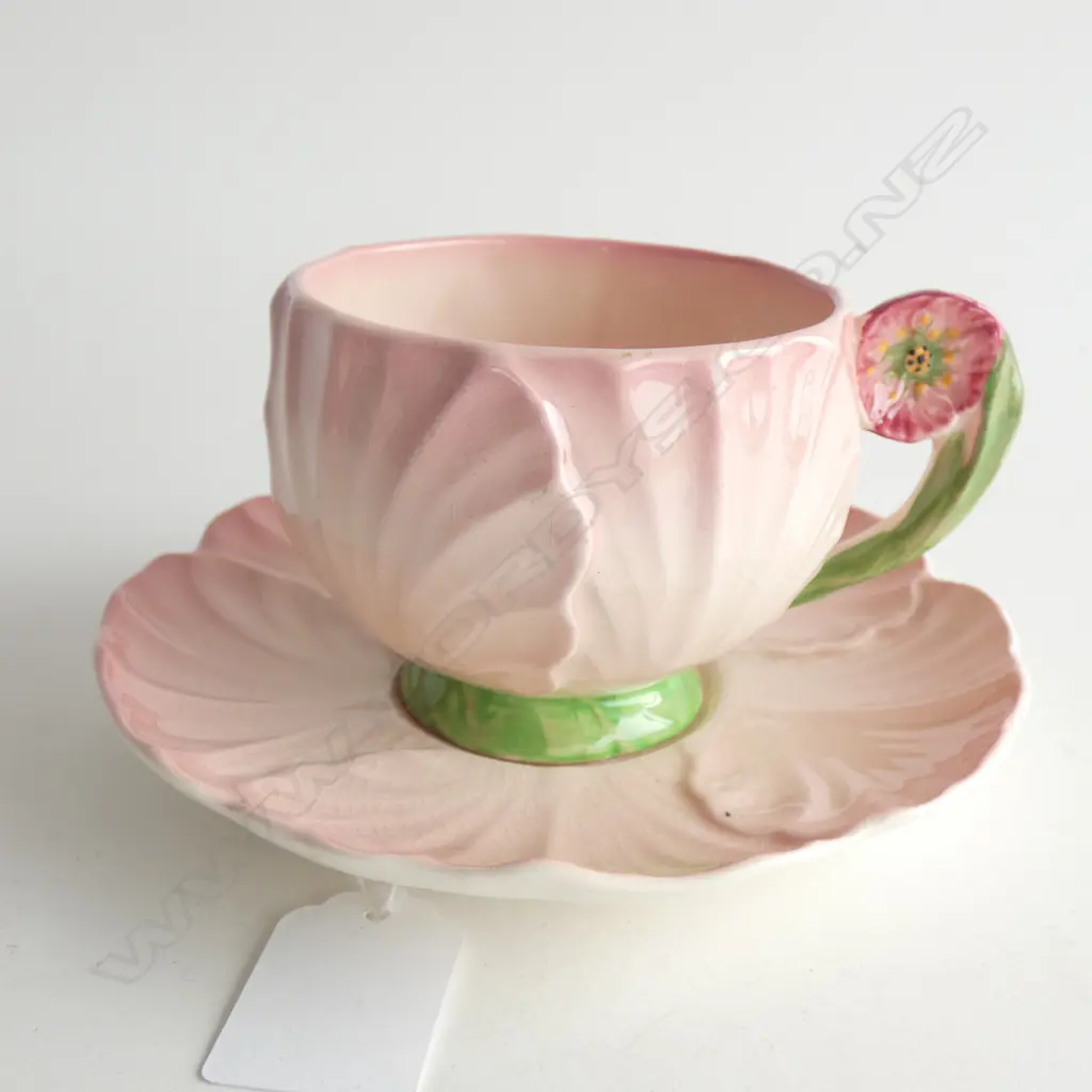 A CARLTON WARE EMBOSSED PINK BUTTERCUP CUP AND SAUCER Image 1++