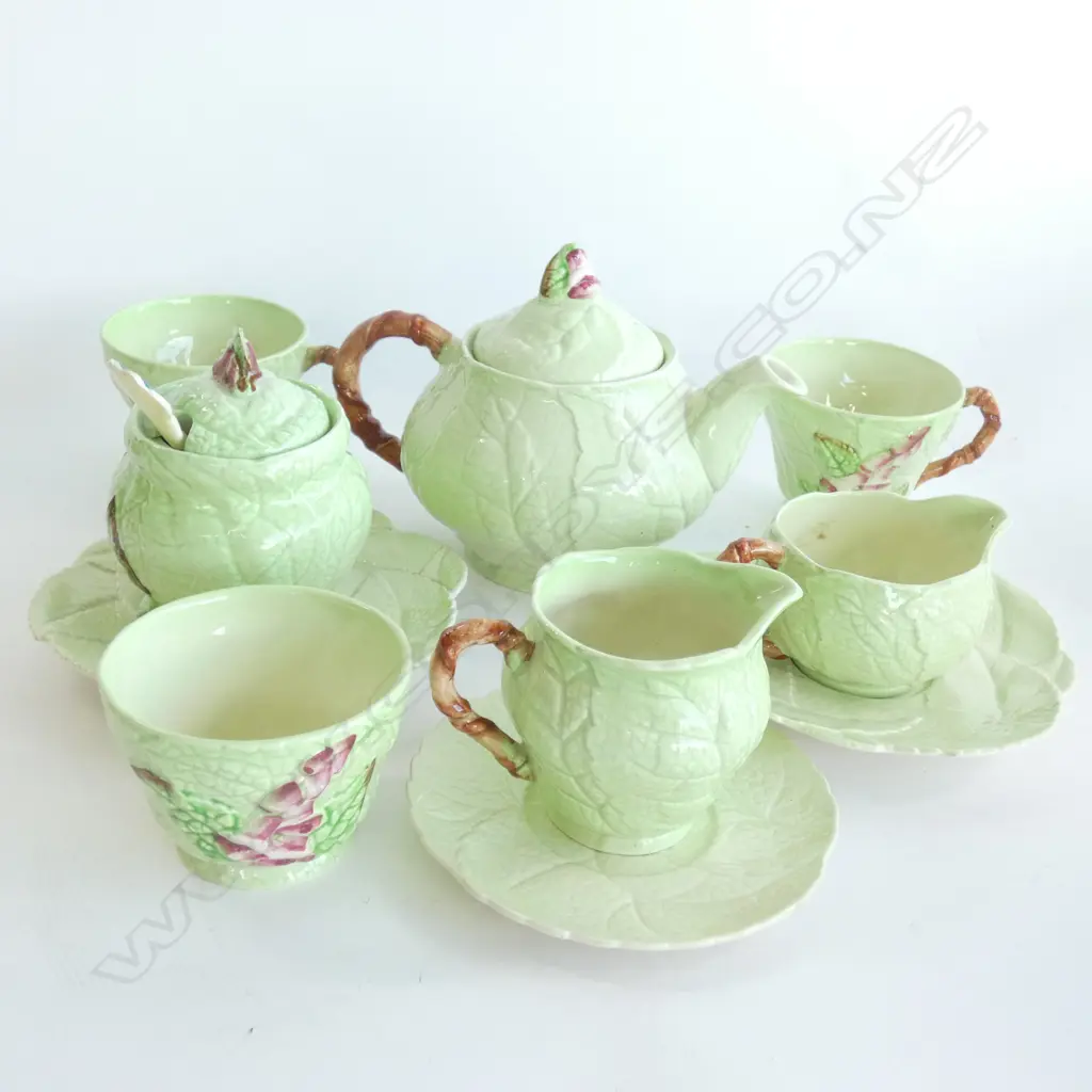A CARLTONWARE EMBOSSED TEA SET, FOXGLOVE WITH GREEN GROUND Image 1++