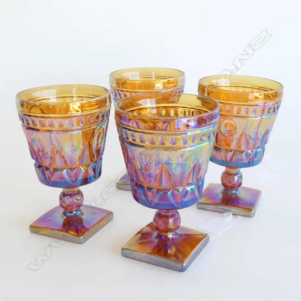 FOUR DEPRESSION GLASS WINE GOBLETS, ON SQUARE PEDESTAL BASES. COLOUR SIMILAR TO MARIGOLD Image 1++