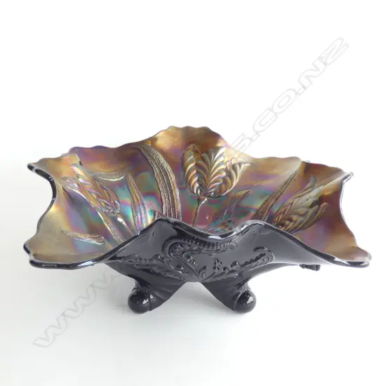 A CARNIVAL GLASS FLUTED BOWL