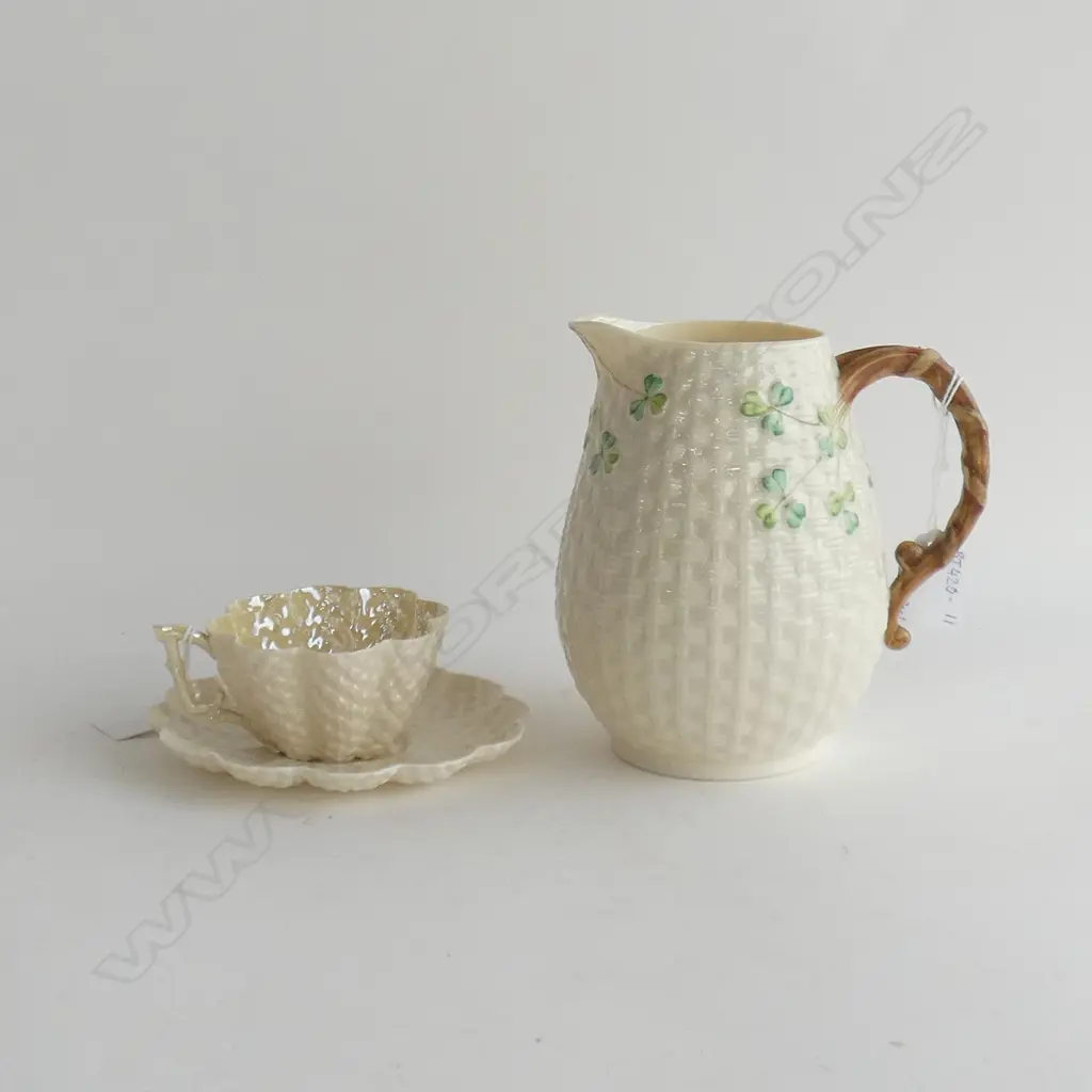BELLEEK POTTERY; DIMPLE CUP & SAUCER (2ND BLACK MARK) & SHAMROCK JUG (H 165MM) (3RD BLACK MARK) Image 1++
