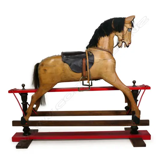 A Victorian pine rocking horse,
