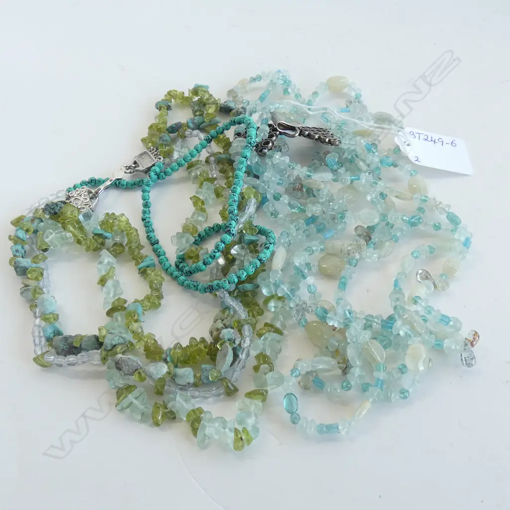 TWO MULTI-STRAND GEMSTONE NECKLACES Image 1++