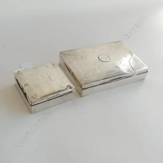 2 OLD SILVER CIGARETTE BOXES (IN BAD REPAIR).