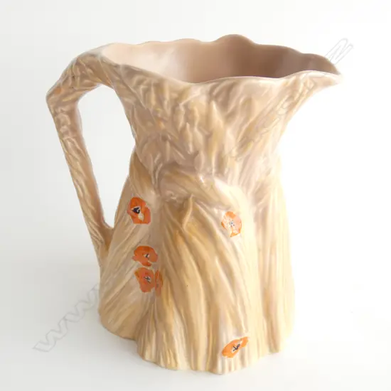 A Burleigh Ware jug, rabbit and corn stooks