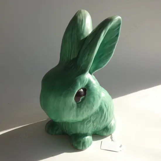 A Sylvac snub nosed green rabbit