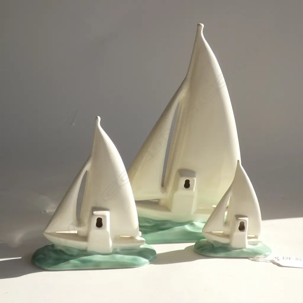 A graduated set of three Poole yachts Image 1++