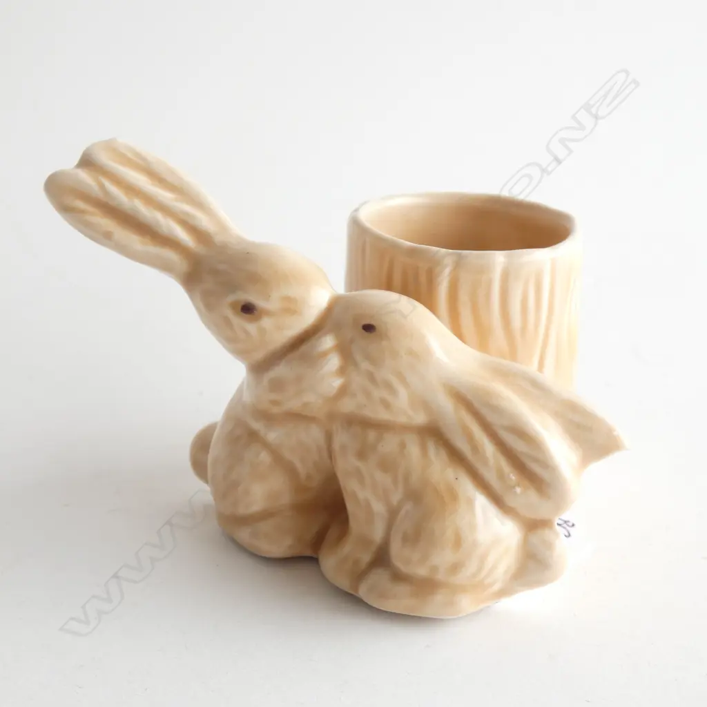 A Sylvac kissing rabbits match holder and striker Image 1++