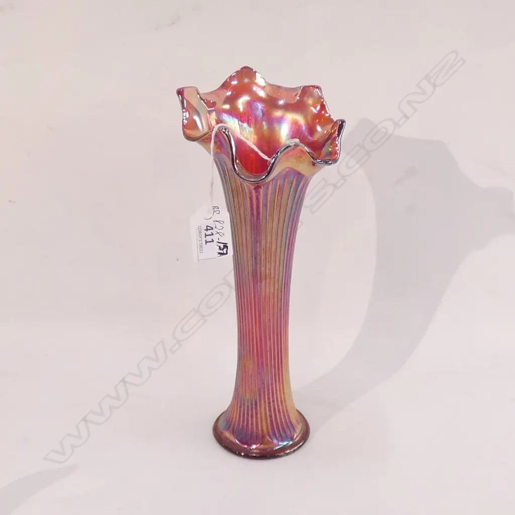 A red, slender Carnival Glass vase Image 1++
