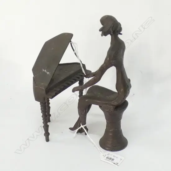 METAL SCULPTURE; WOMAN PLAYING PIANO H.210mm