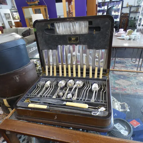 WALNUT CASED BONE HANDLED SILVER PLATE CUTLERY SET