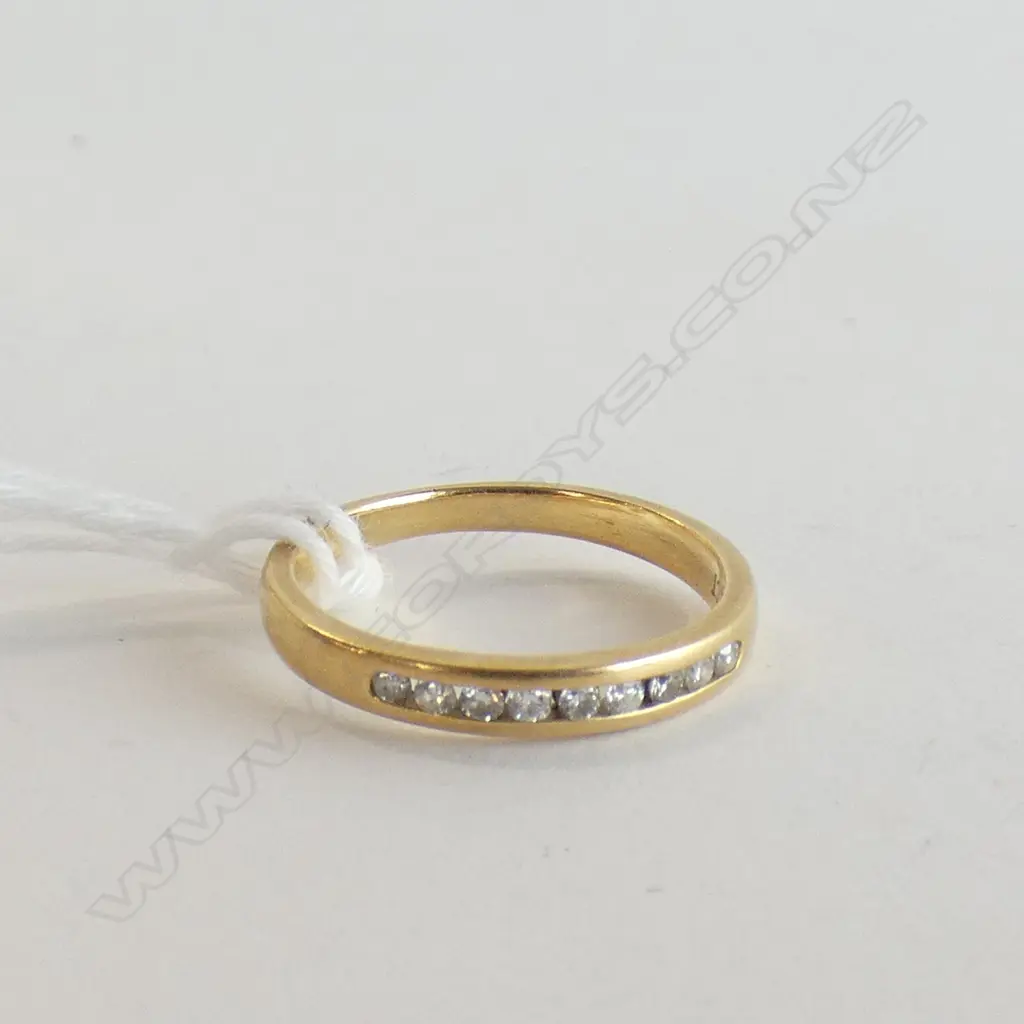 18CT & 9 BRILLIANT CUT DIAMOND RING CHANNEL SET Image 1++