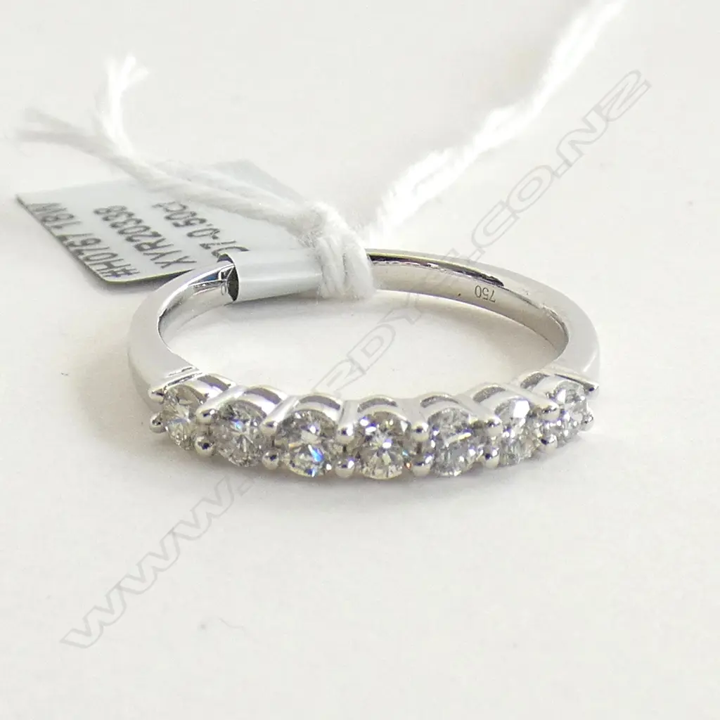 18CT WHITE GOLD AND DIAMOND BAND Image 1++