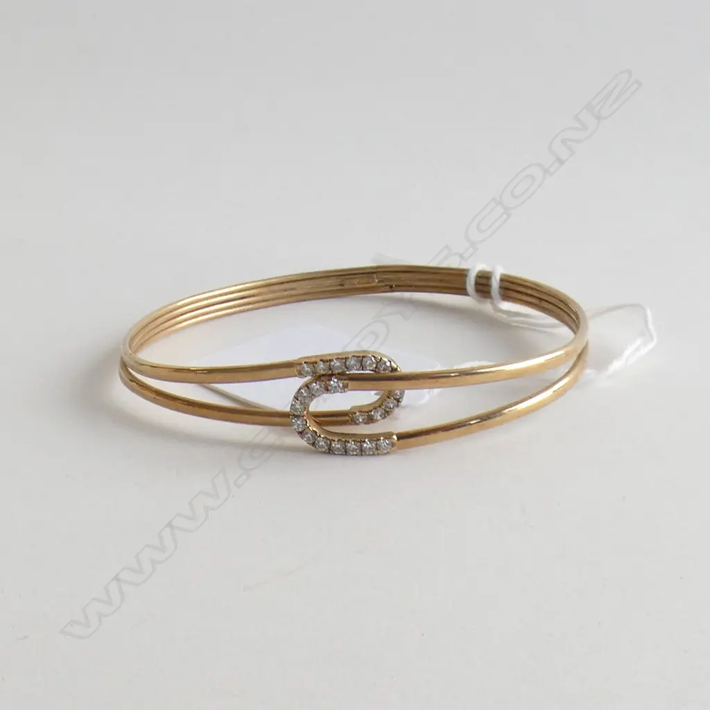 9CT GOLD AND CZ BANGLE (very delicate crack to the base) 5.11gm Image 1++