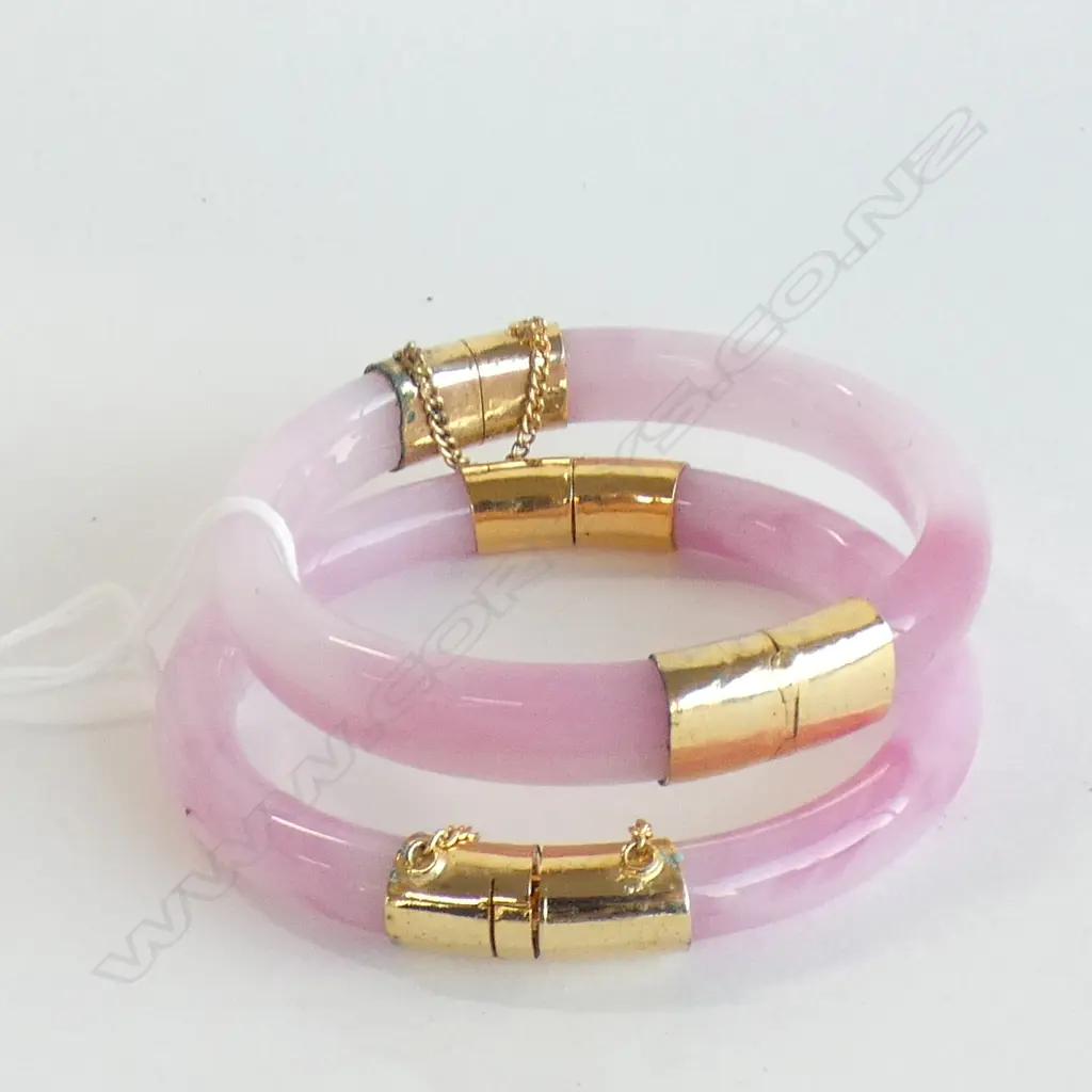 TWO GLASS PINK JADE COLOURED BANGLES Image 1++