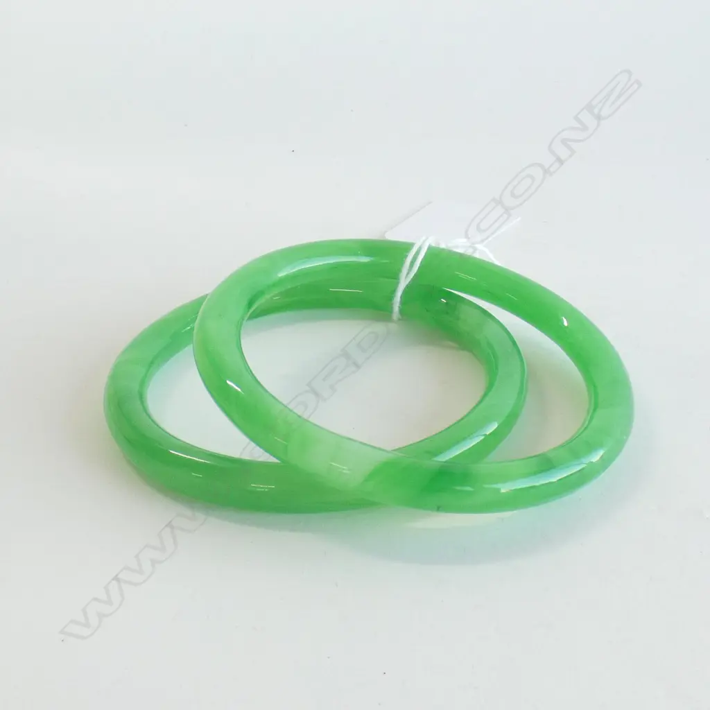 TWO GLASS JADE COLOURED BANGLES Image 1++